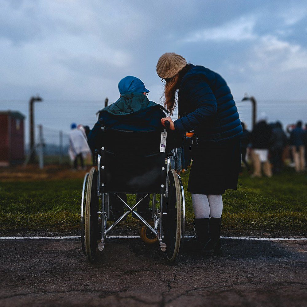 Client from workers' compensation claim in wheelchair